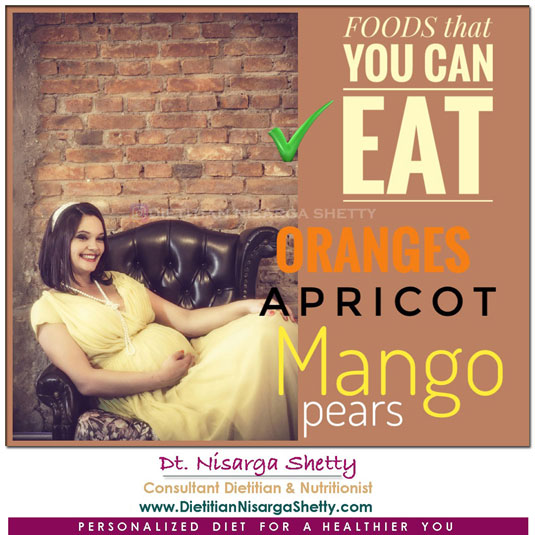 Pregnant lady sitting on sofa